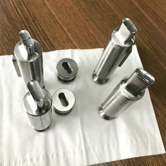 Punches and dies for a rotary tablet press